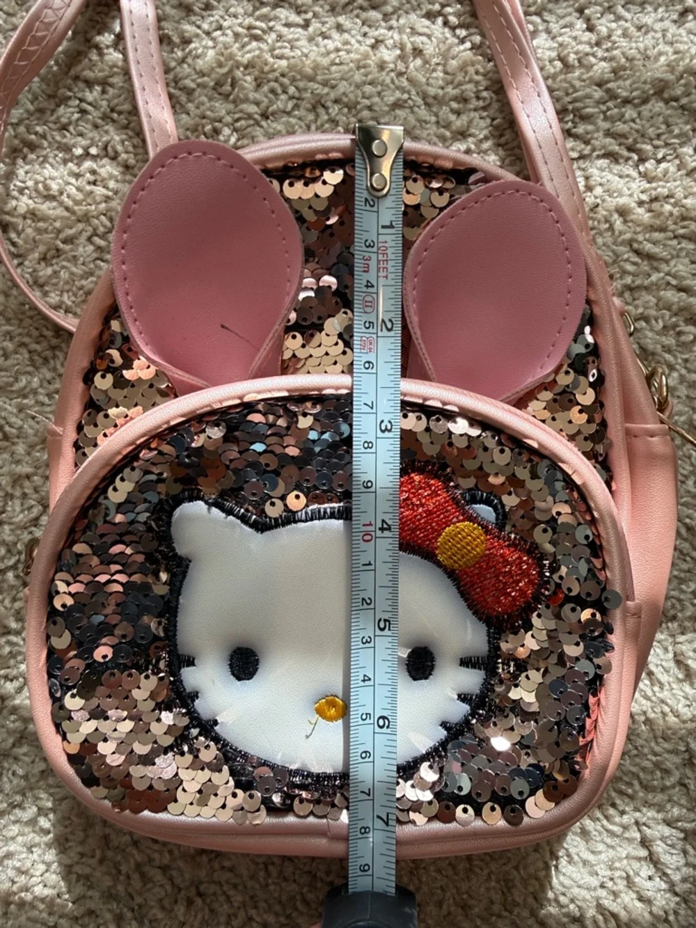 Hello Kitty Pink Sequin Crossbody Bag with Red Bow Accent